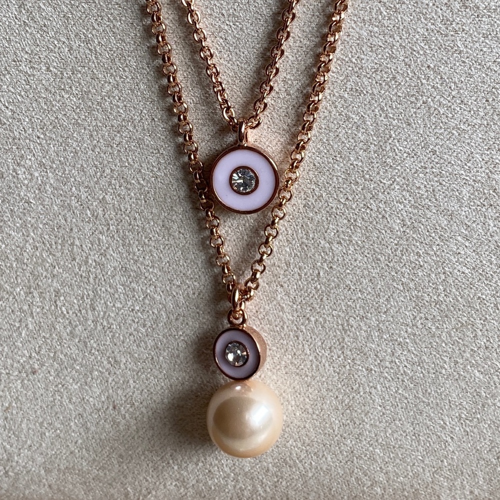 Kate Spade rose gold necklace with faux pearl.